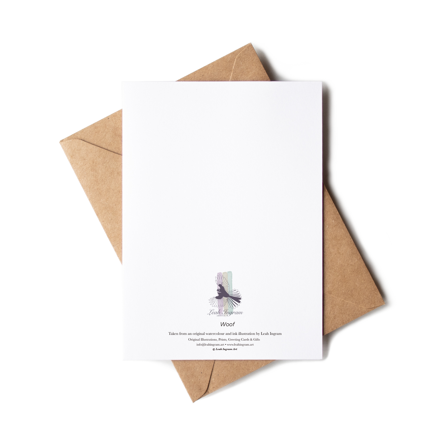 White card with a printed design on a brown envelope against a white background