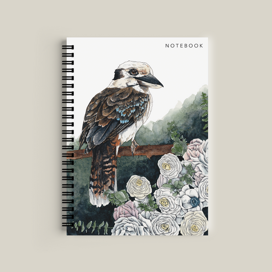 Notebook with a bird and floral design on the cover