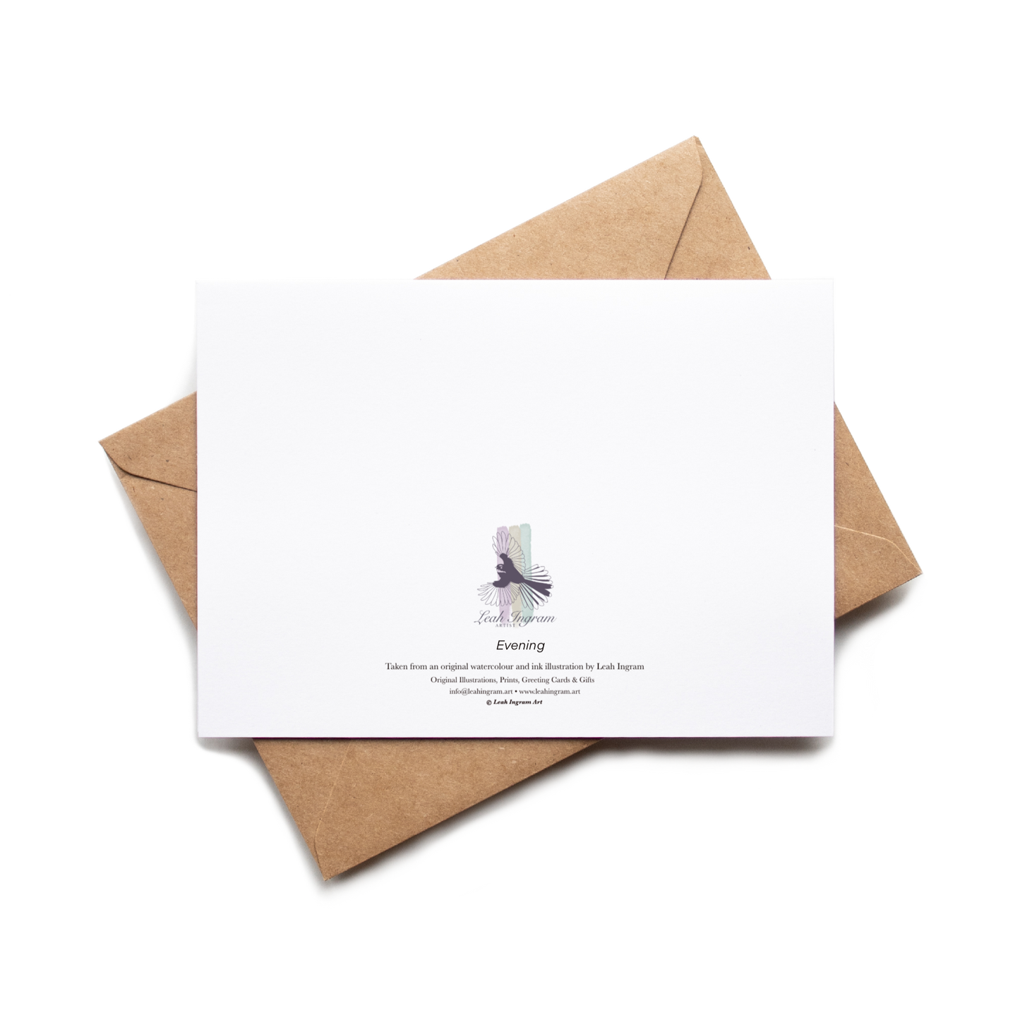 White card with a purple design on a brown envelope against a white background