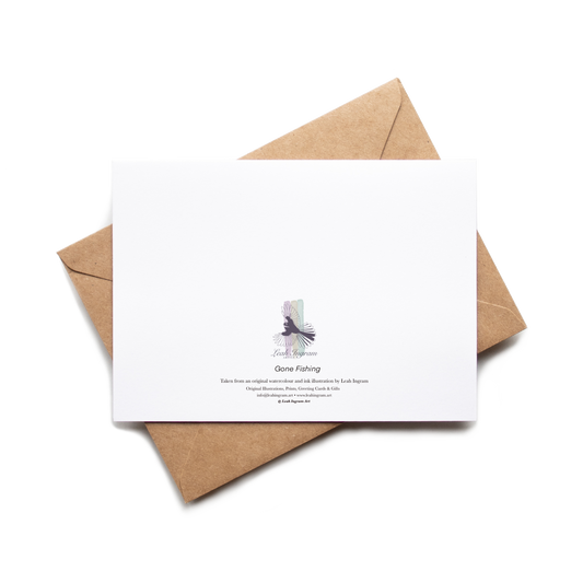 White card with a purple design on a brown envelope against a white background
