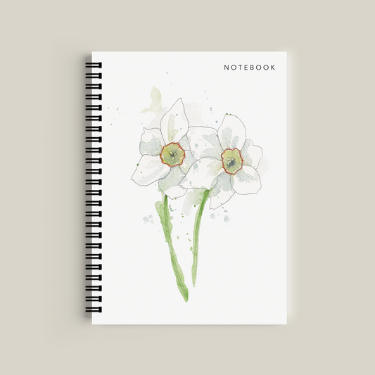 Notebook with floral design on a beige background