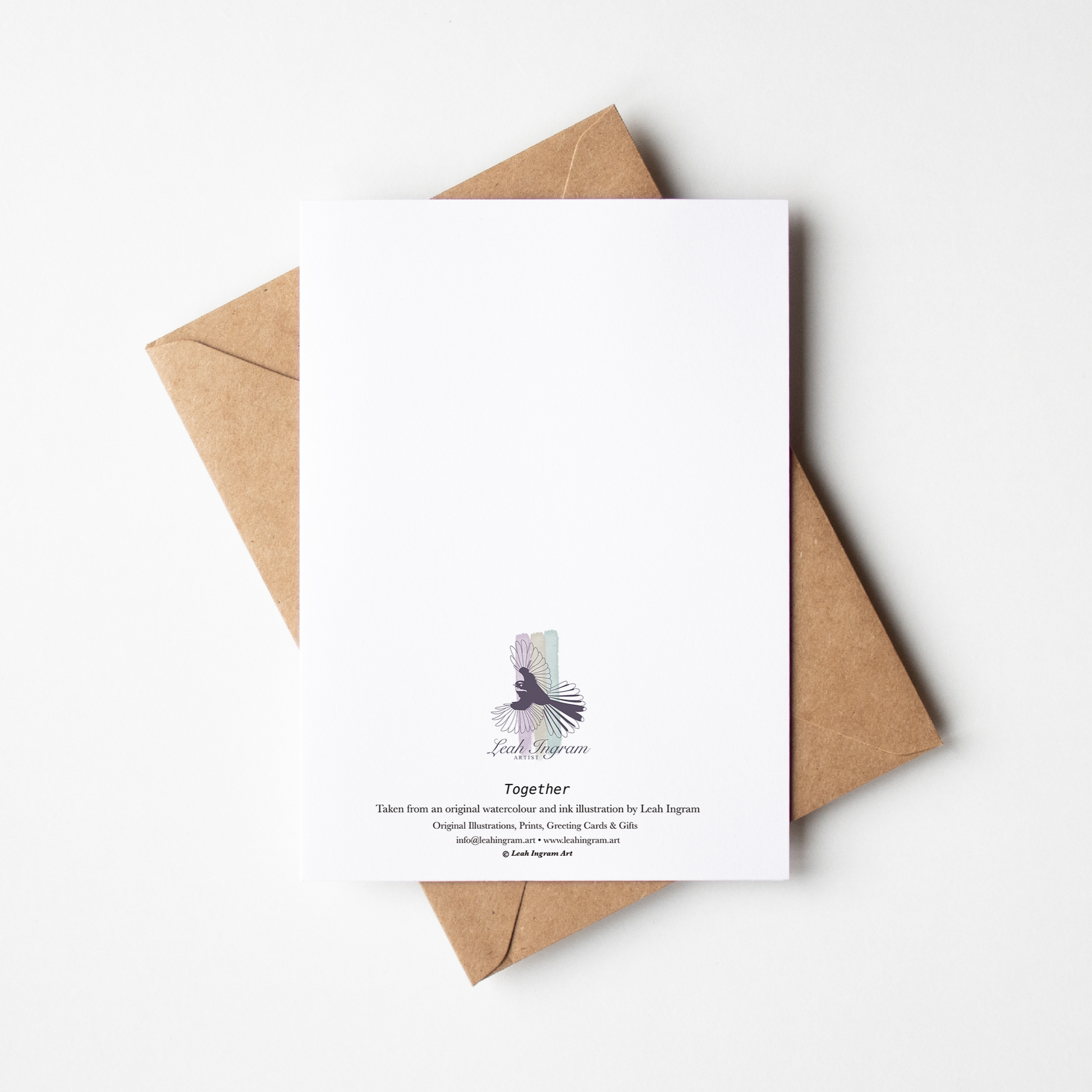 White card with brown envelope on a white background