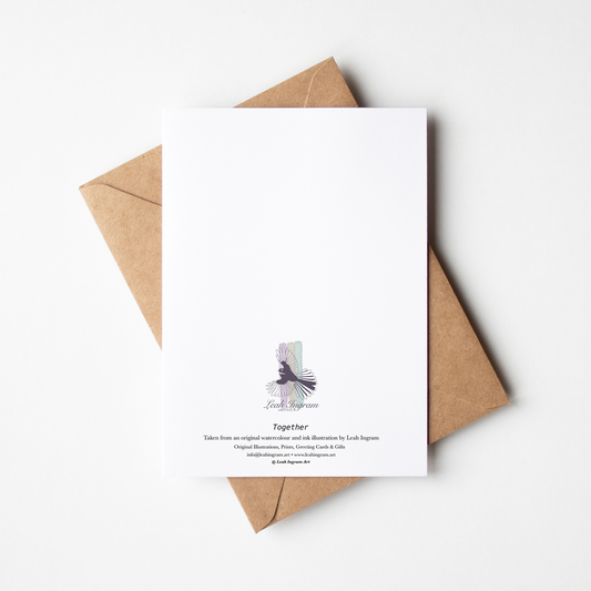White card with brown envelope on a white background